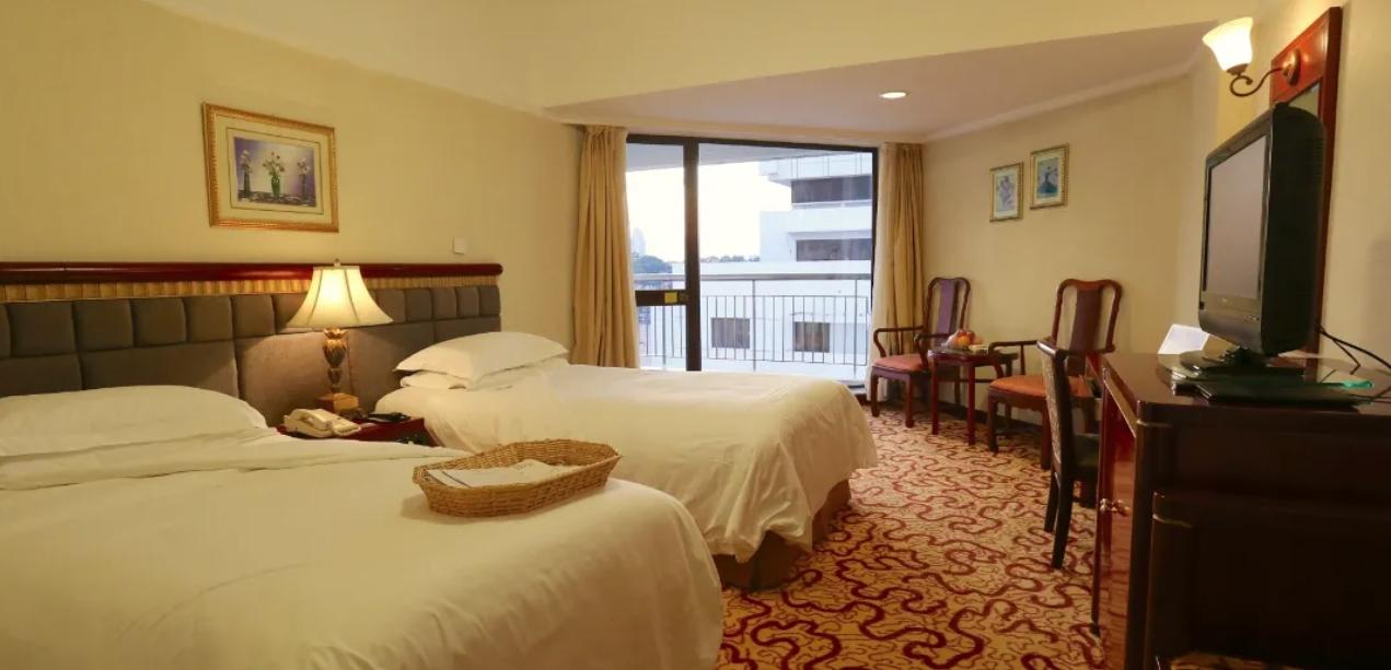 Huiquan Dynasty Hotel Циндао Экстерьер фото