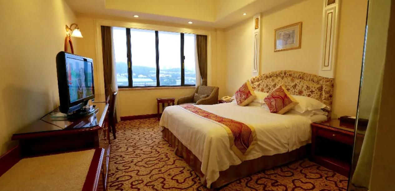 Huiquan Dynasty Hotel Циндао Экстерьер фото