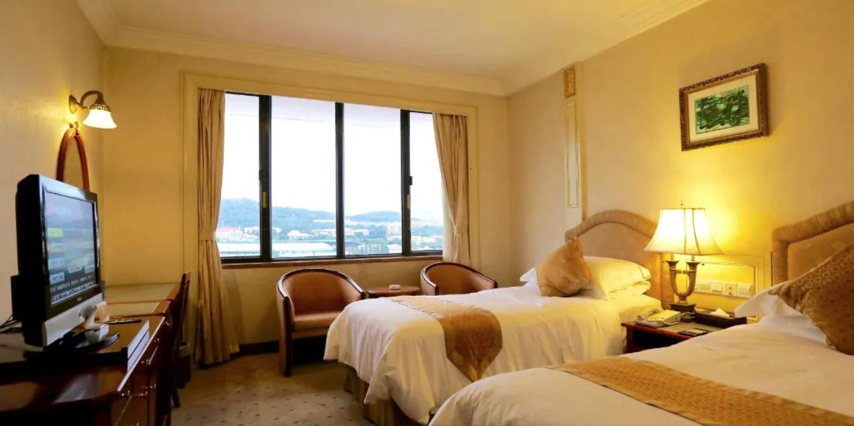 Huiquan Dynasty Hotel Циндао Экстерьер фото