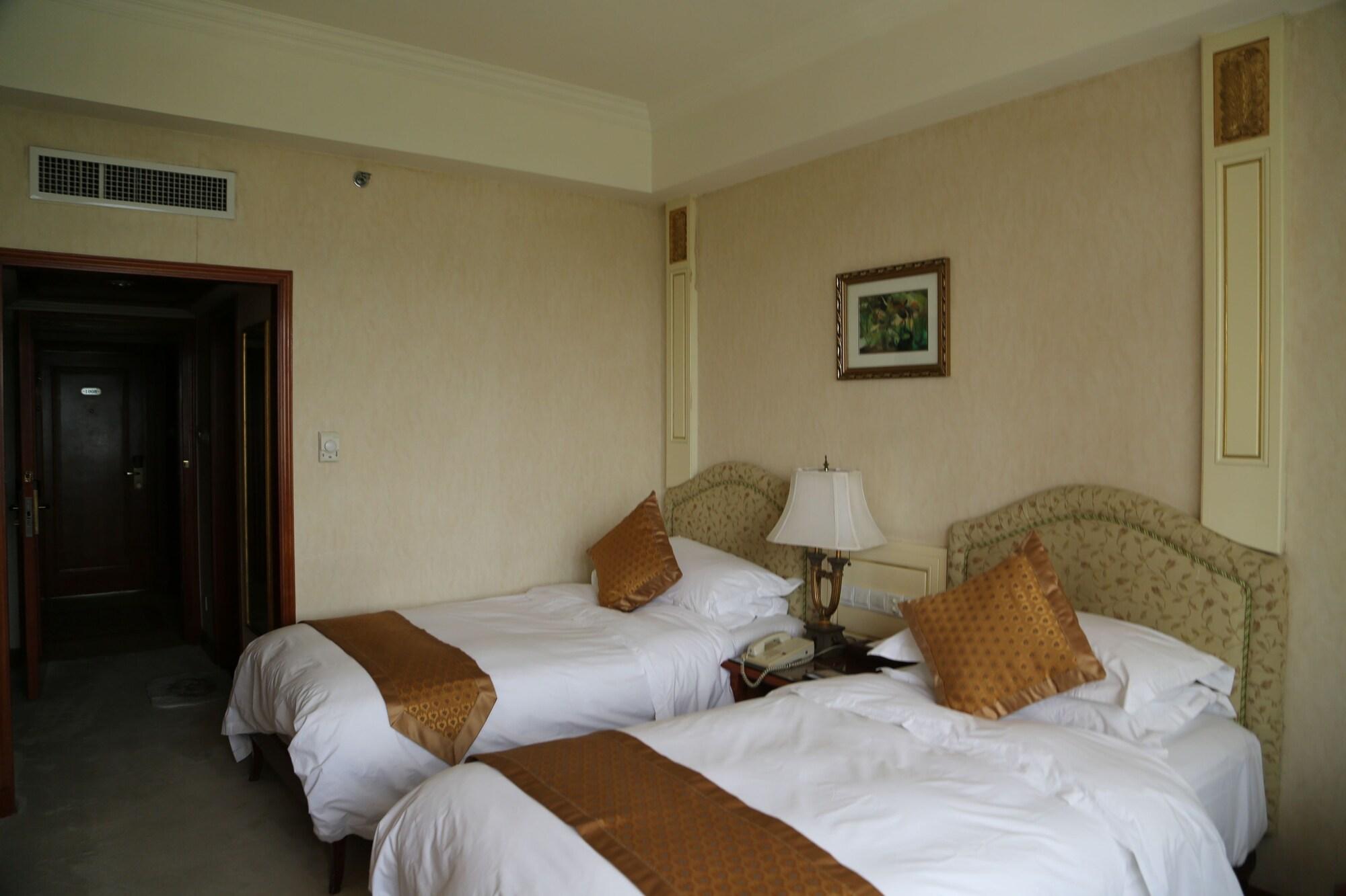 Huiquan Dynasty Hotel Циндао Экстерьер фото