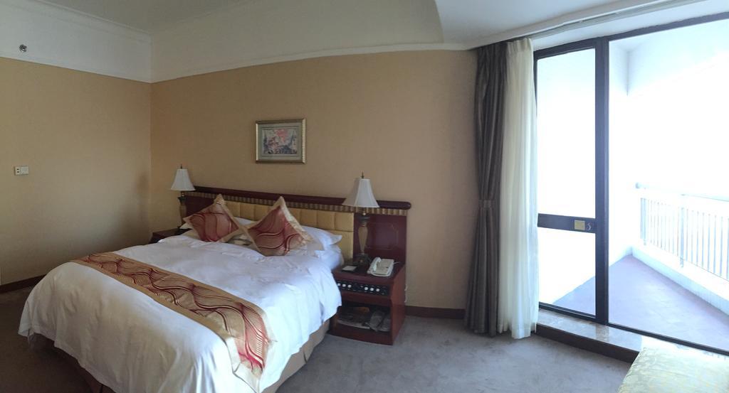 Huiquan Dynasty Hotel Циндао Экстерьер фото