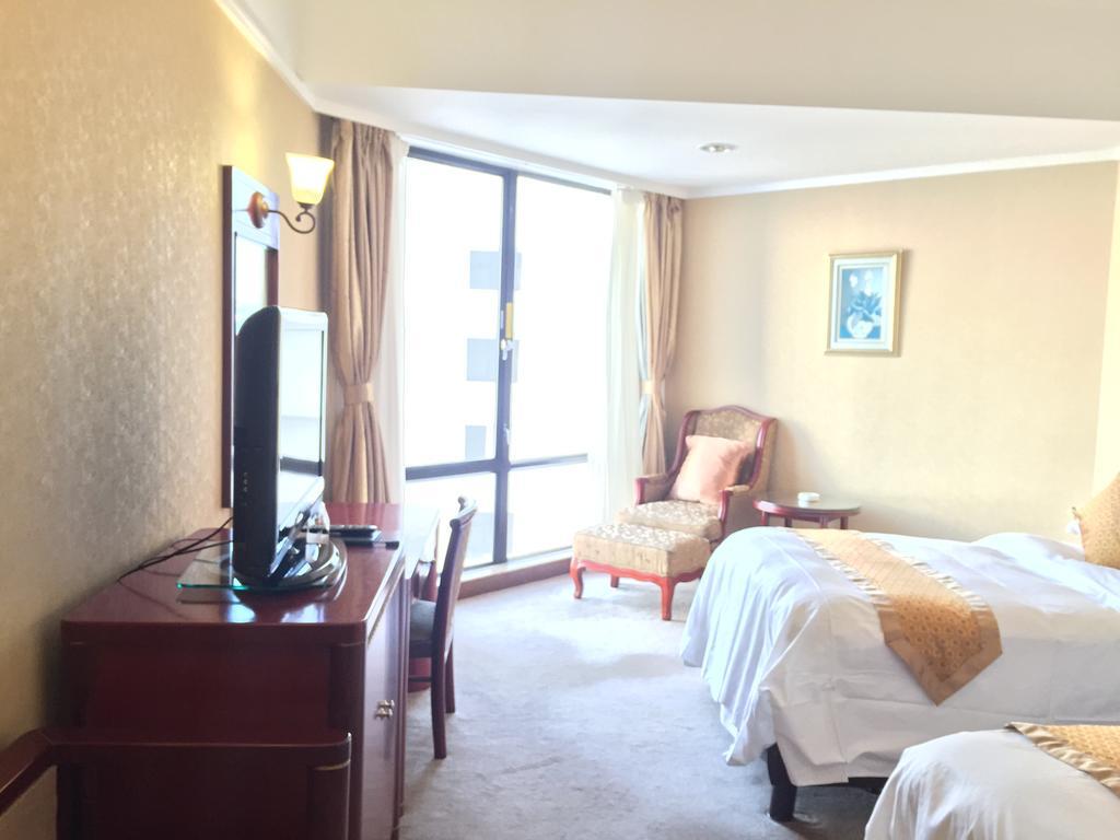 Huiquan Dynasty Hotel Циндао Экстерьер фото