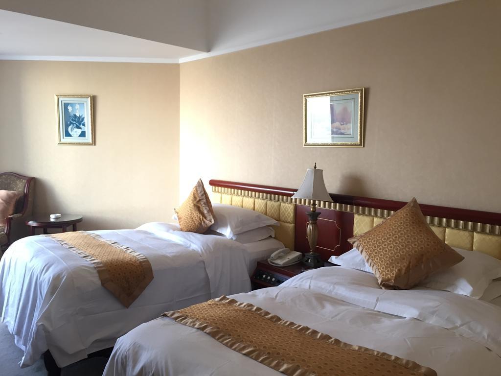 Huiquan Dynasty Hotel Циндао Экстерьер фото