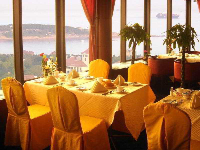 Huiquan Dynasty Hotel Циндао Экстерьер фото