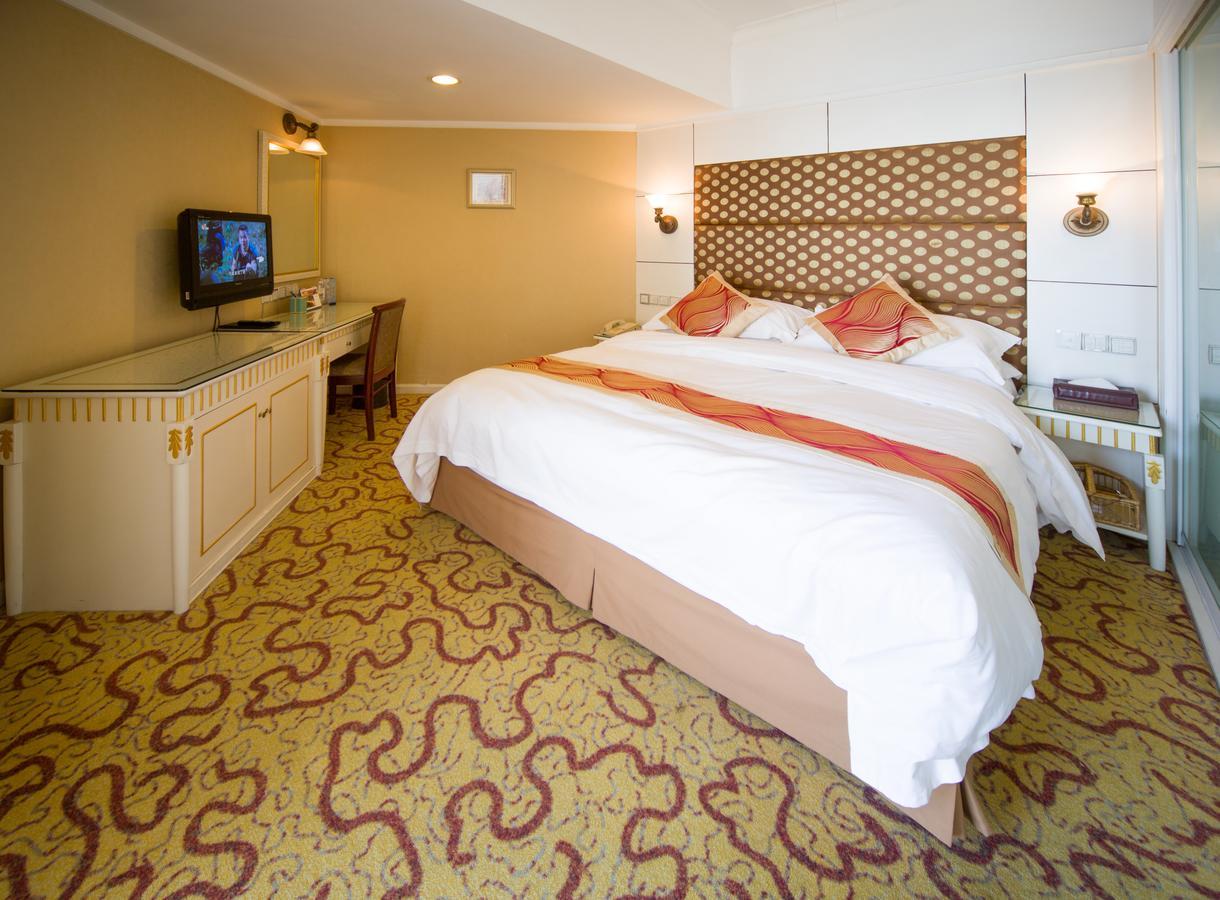 Huiquan Dynasty Hotel Циндао Экстерьер фото