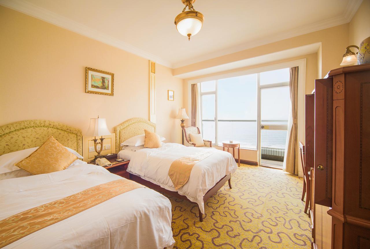 Huiquan Dynasty Hotel Циндао Экстерьер фото