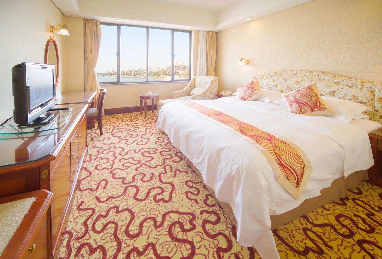 Huiquan Dynasty Hotel Циндао Экстерьер фото