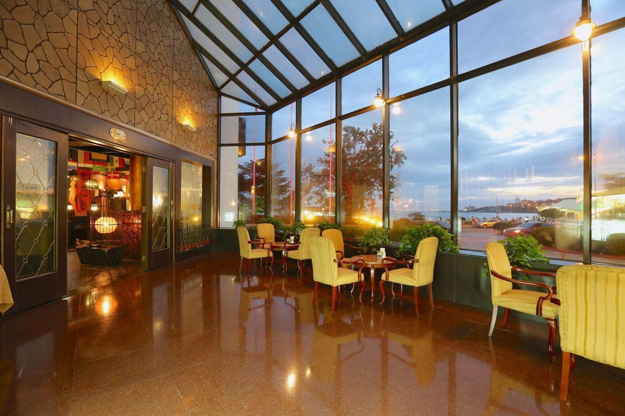 Huiquan Dynasty Hotel Циндао Экстерьер фото