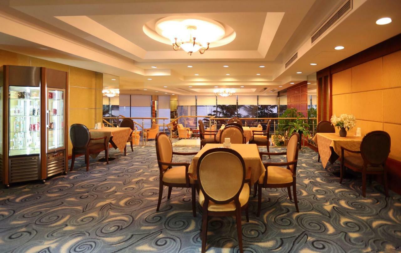 Huiquan Dynasty Hotel Циндао Экстерьер фото