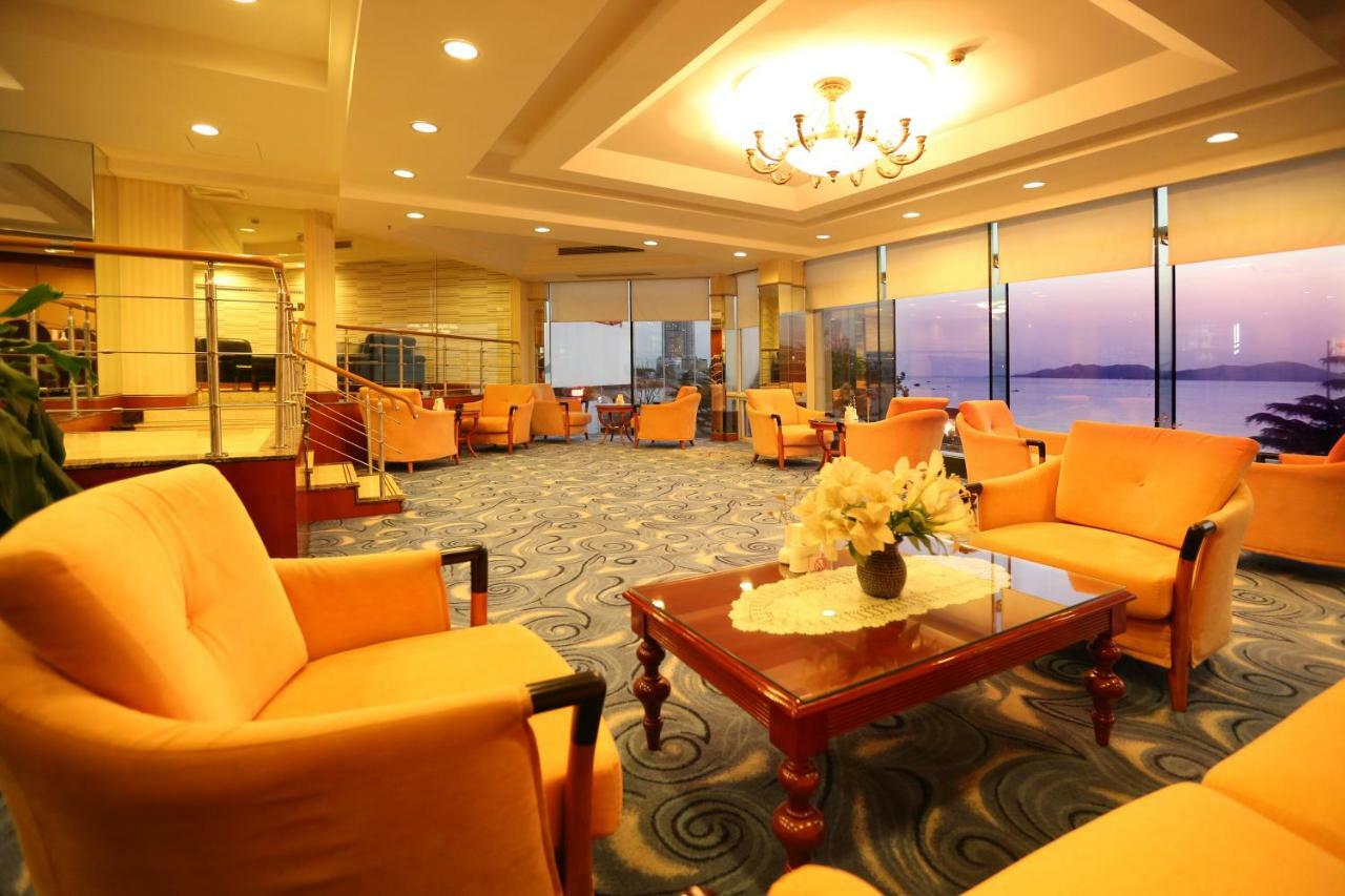 Huiquan Dynasty Hotel Циндао Экстерьер фото