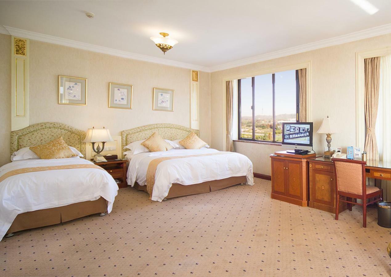 Huiquan Dynasty Hotel Циндао Экстерьер фото